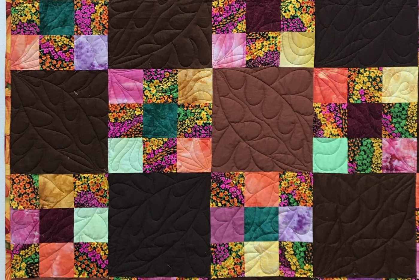 brown patchwork quilt